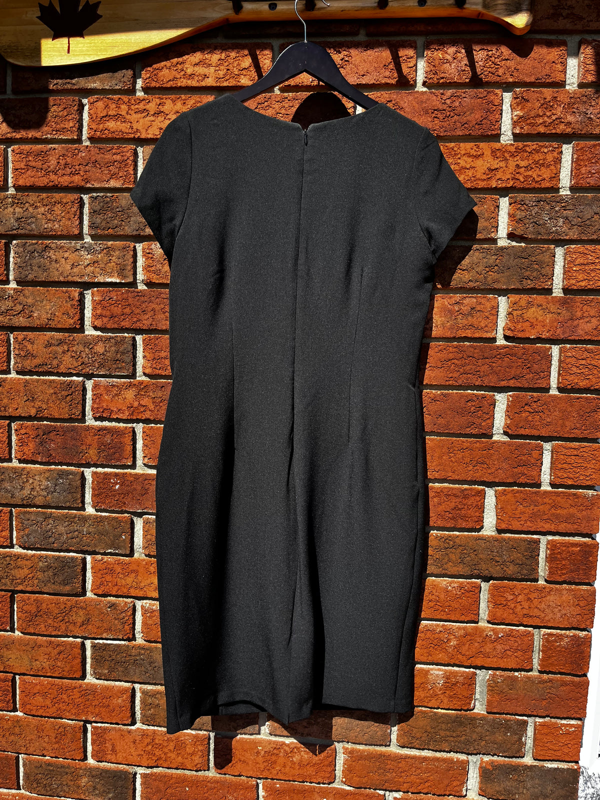 Cleo Brass Tube Neckline Black Dress